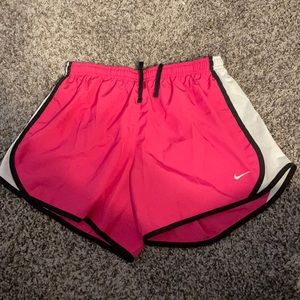 Pink Nike Dri-Fit shorts